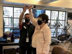 Resident exercising in gym